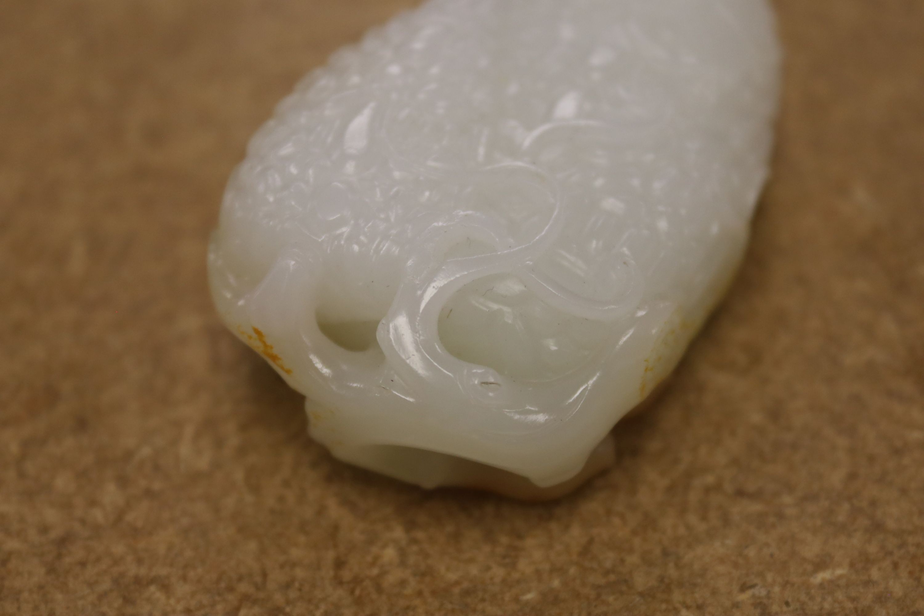 A Chinese white and russet skin jade carving, 7cm high